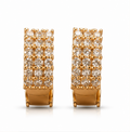 Gold Pavé Crystal Huggie Hoop Earrings model 1