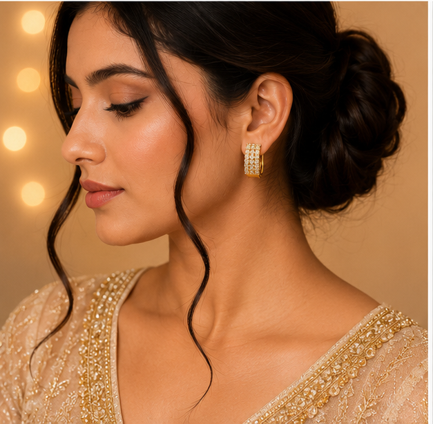 Gold Pavé Crystal Huggie Hoop Earrings model 1